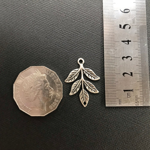 Leafy branch antique silver